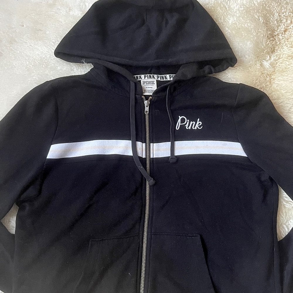 Black Victoria’s Secret sweater.